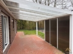 Überdachte Terrasse - Verkauf: Großzügiger Bungalow mit Garage und Einliegerwohnung