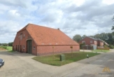 Außenansicht Scheune - Verkauf: Resthof mit Wohnhaus und Scheune in schöner ländlicher Lage in Filsum!