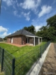 Seitenansicht - Großheide/ Westerende - neuwertiger Bungalow mit Dachgeschosswohnung!